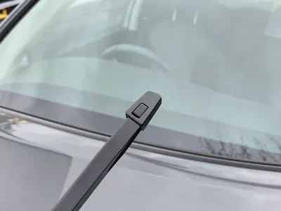 Wiper arm with a narrow push-button end, blade removed